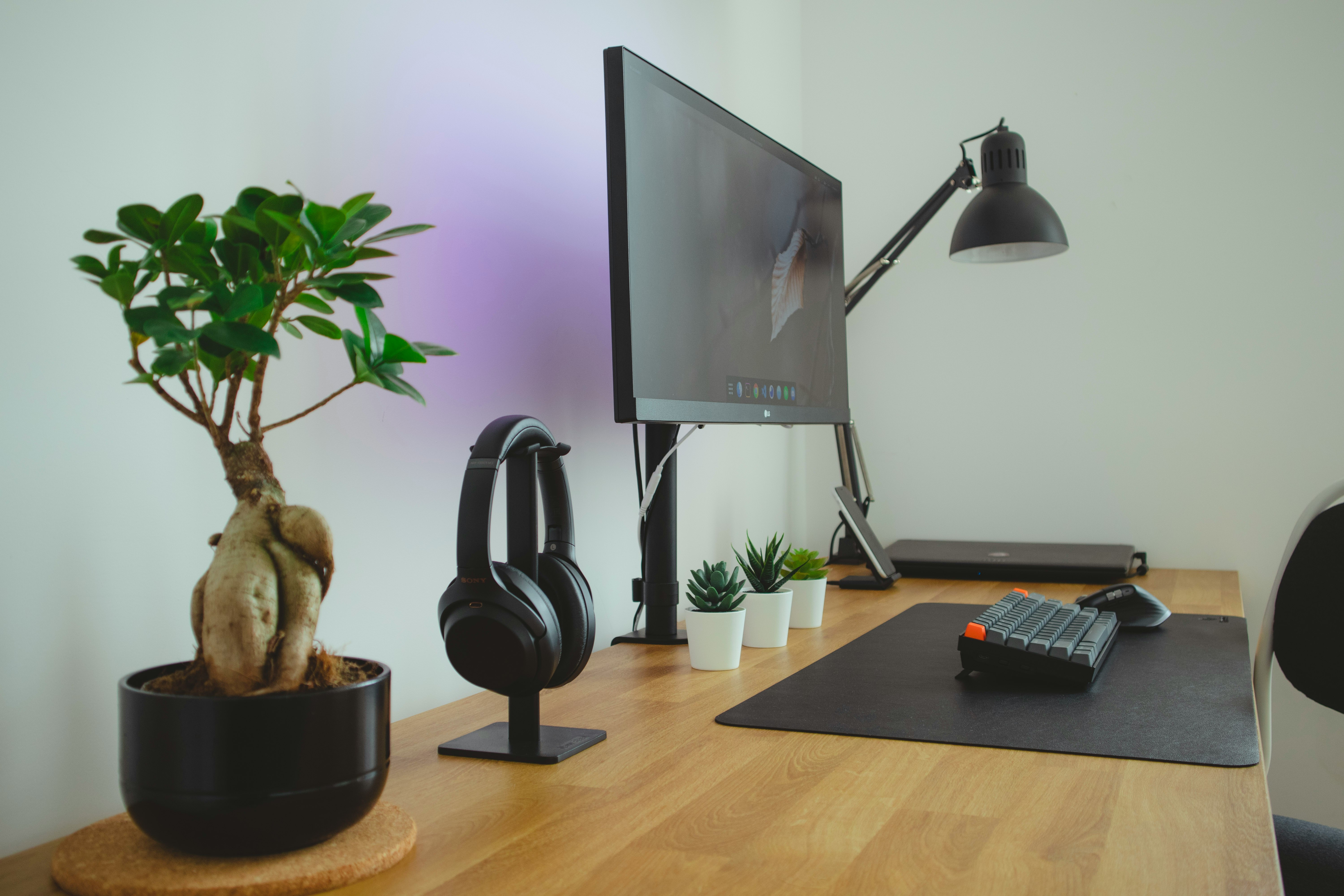 black flat screen tv on brown wooden table